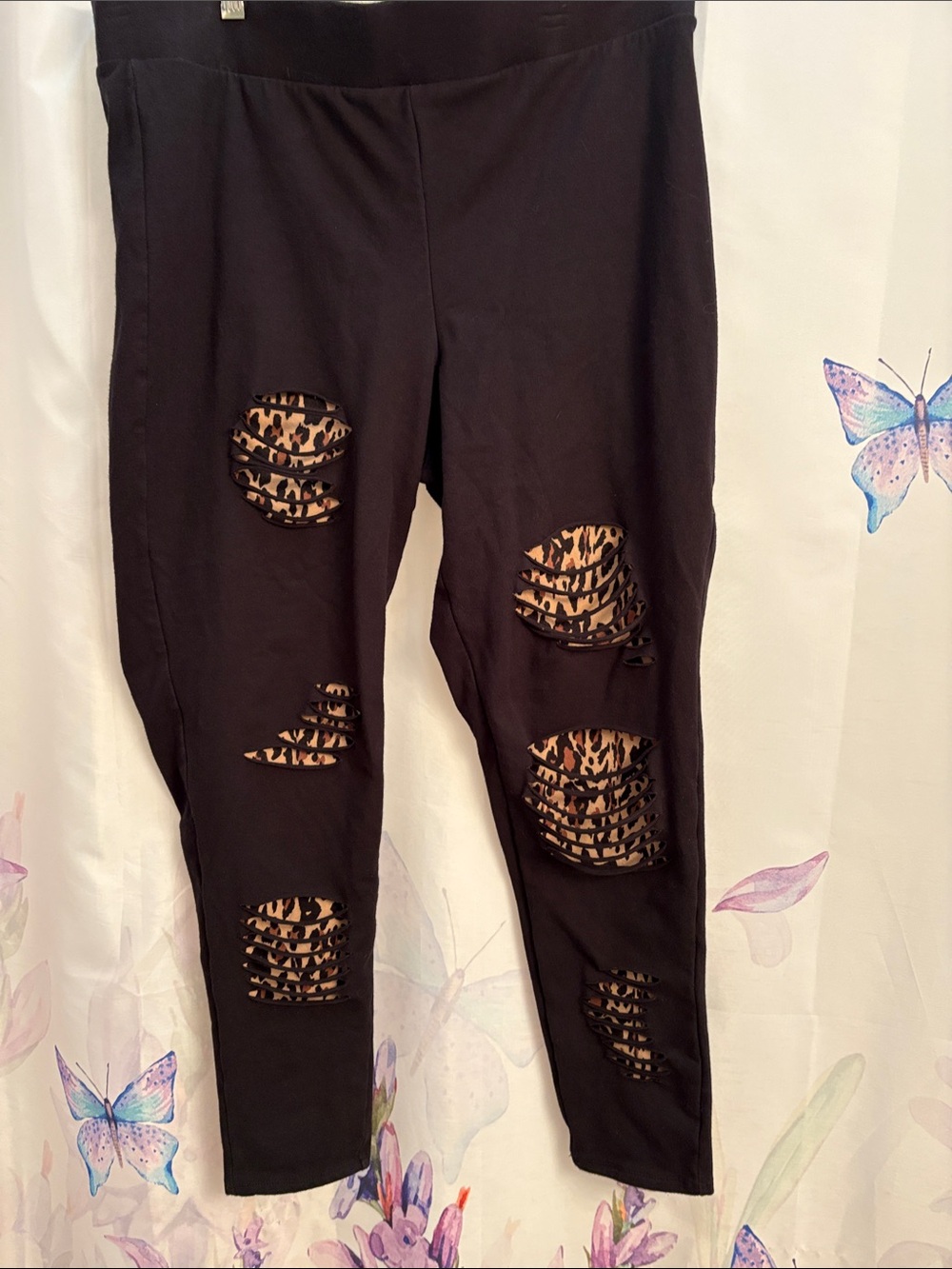 Torrid size 3 Black Leggings with Leopard Patch Cutouts